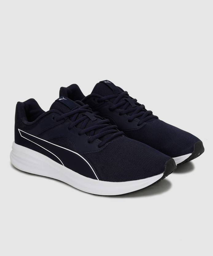 Side view of PUMA Men's Running Lace-Up Sneakers, showcasing the breathable upper, cushioned midsole, durable outsole, and iconic PUMA logo, designed for comfort and performance in running.