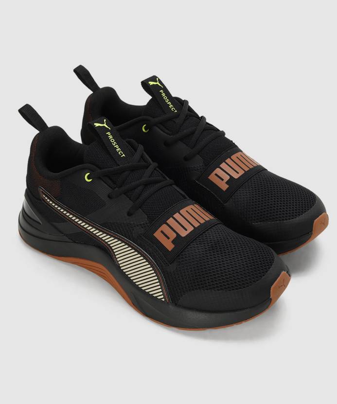 Side view of PUMA Men's Running Lace-Up Sneakers, showcasing the breathable upper, cushioned midsole, durable outsole, and iconic PUMA logo, designed for comfort and performance in running.