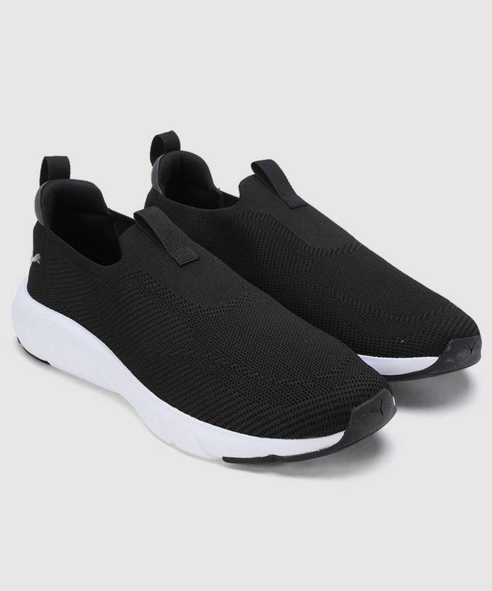 Side view of PUMA Men's Running Slip-On Sneakers, highlighting the breathable upper, cushioned midsole, durable outsole, and iconic PUMA logo, designed for comfort and performance in running and active wear.