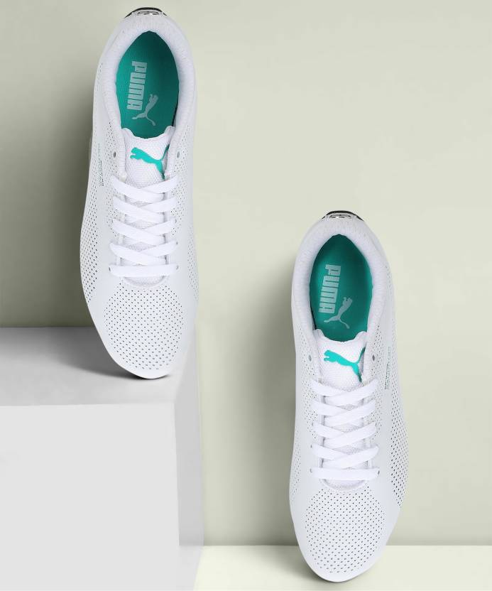 Side view of PUMA Men's Lifestyle Lace-Up Sneakers, showcasing the sleek design, breathable upper, cushioned insole, and iconic PUMA logo, designed for comfort and style in everyday wear.