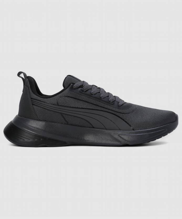 Side view of PUMA Men's Lifestyle Lace-Up Sneakers, showcasing the sleek design, breathable upper, cushioned insole, and iconic PUMA logo, designed for comfort and style in everyday wear.