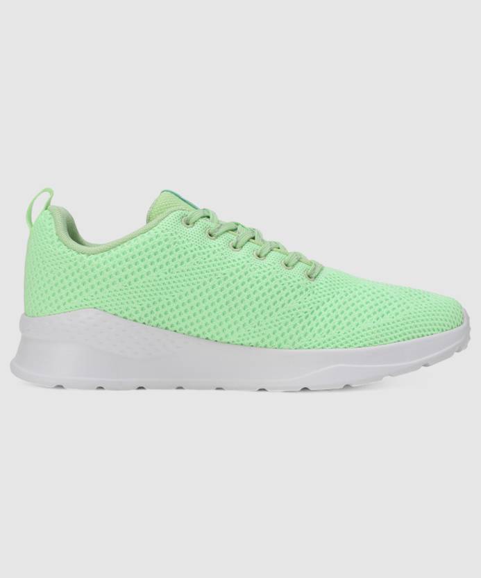 Side view of PUMA Women's Lifestyle Lace-Up Sneakers, showcasing the sleek design, breathable upper, cushioned insole, and iconic PUMA logo, designed for comfort and style in everyday wear.