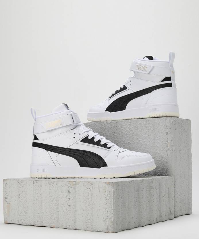 Side view of PUMA Men's Lifestyle Lace-Up Sneakers, showcasing the sleek design, breathable upper, cushioned insole, and iconic PUMA logo, designed for comfort and style in everyday wear.