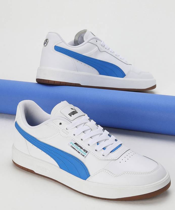 Side view of PUMA Men's Lifestyle Lace-Up Sneakers, showcasing the sleek design, breathable upper, cushioned insole, and iconic PUMA logo, designed for comfort and style in everyday wear.