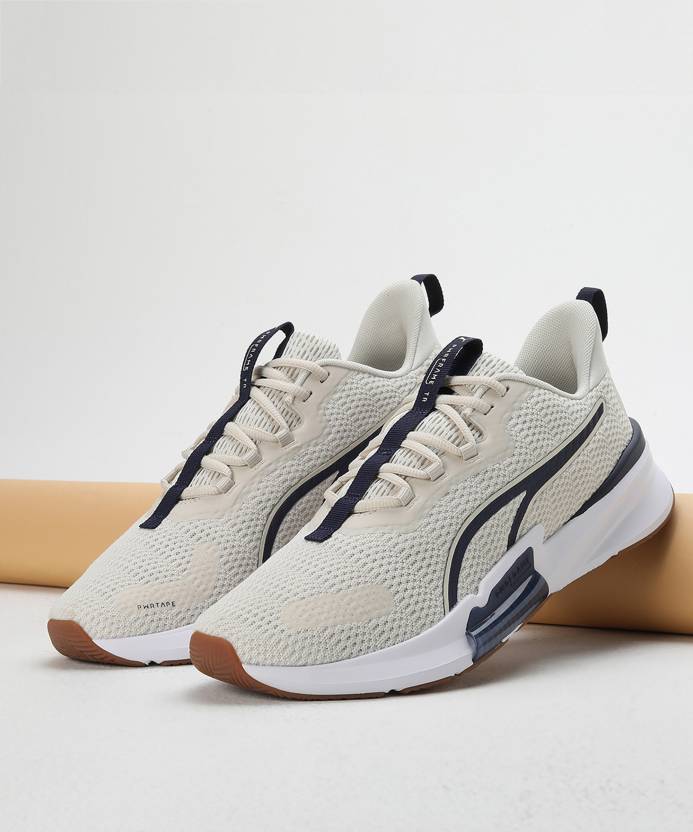 Side view of PUMA Men's Running Lace-Up Sneakers, showcasing the breathable upper, cushioned midsole, durable outsole, and iconic PUMA logo, designed for comfort and performance in running.