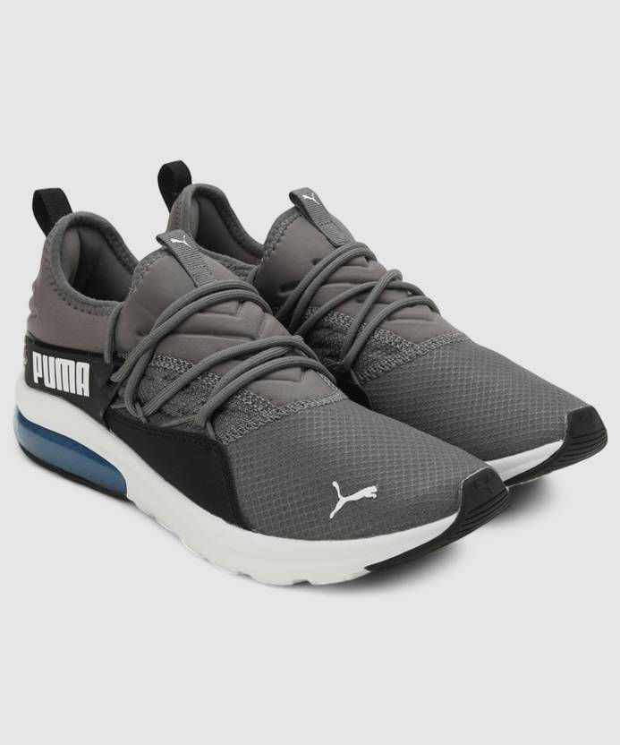 Side view of PUMA Men's Lifestyle Lace-Up Sneakers, showcasing the sleek design, breathable upper, cushioned insole, and iconic PUMA logo, designed for comfort and style in everyday wear.