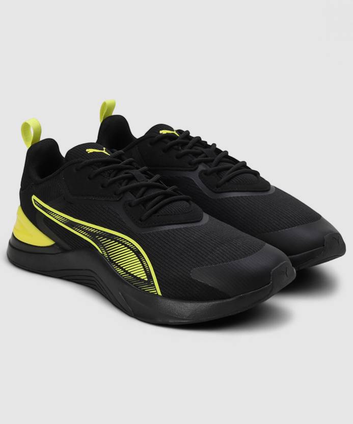 Side view of PUMA Men's Running Lace-Up Sneakers, showcasing the breathable upper, cushioned midsole, durable outsole, and iconic PUMA logo, designed for comfort and performance in running.