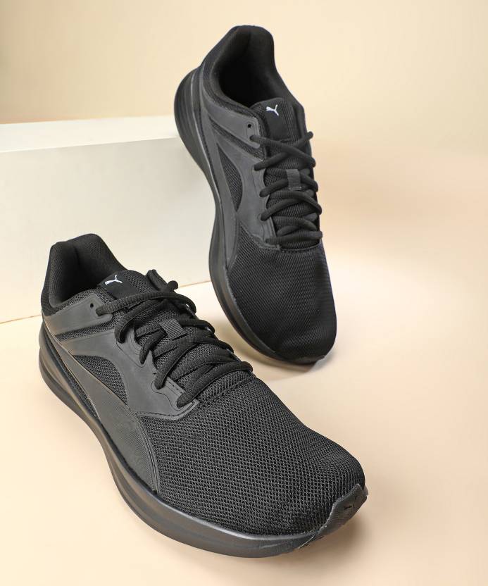 Side view of PUMA Men's Running Lace-Up Sneakers, showcasing the breathable upper, cushioned midsole, durable outsole, and iconic PUMA logo, designed for comfort and performance in running.