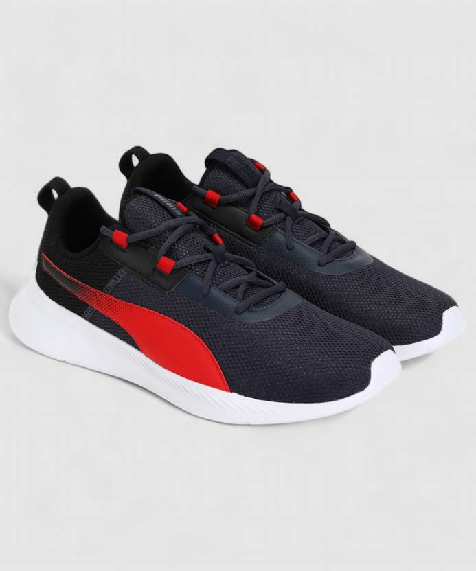 Side view of PUMA Men's Running Lace-Up Sneakers, showcasing the breathable upper, cushioned midsole, durable outsole, and iconic PUMA logo, designed for comfort and performance in running.