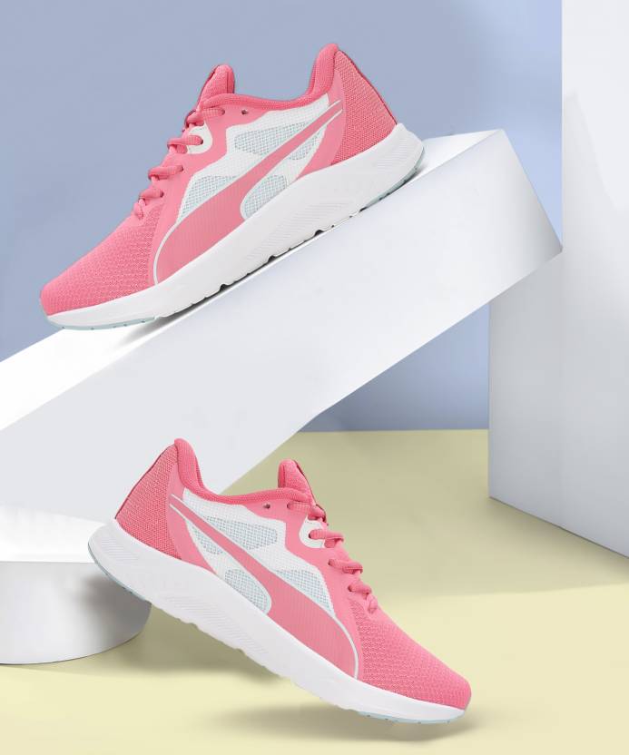 Side view of PUMA Women's Running Lace-Up Sneakers, showcasing the breathable upper, cushioned midsole, durable outsole, and iconic PUMA logo, designed for comfort and performance in running.