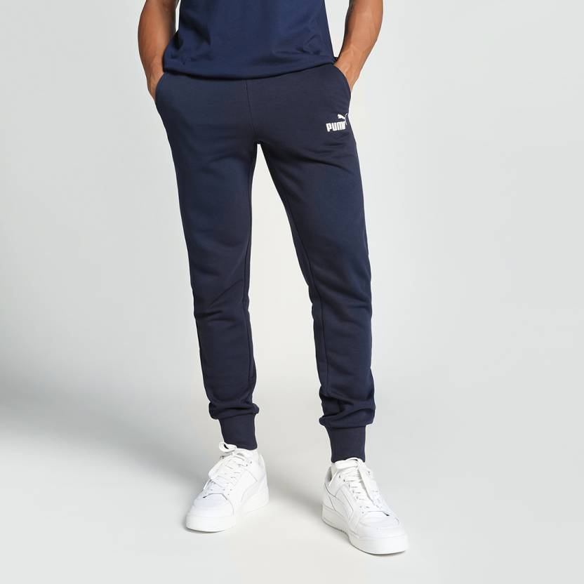 Side view of PUMA Men's Lower, showcasing its relaxed fit, breathable fabric, and signature PUMA logo for a casual, comfortable look.