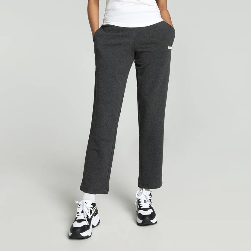 Side view of PUMA Women's Lower, highlighting the relaxed fit, soft fabric, and signature PUMA logo, perfect for casual wear and lifestyle activities.