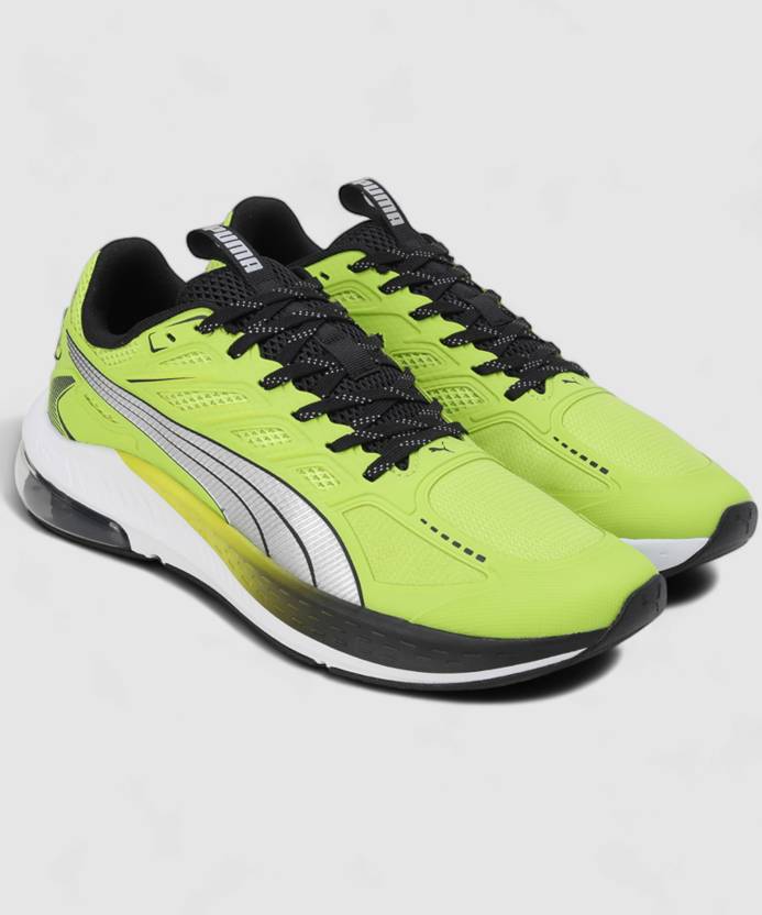 Side view of PUMA Men's Running Lace-Up Sneakers, showcasing the breathable upper, cushioned midsole, durable outsole, and iconic PUMA logo, designed for comfort and performance in running.