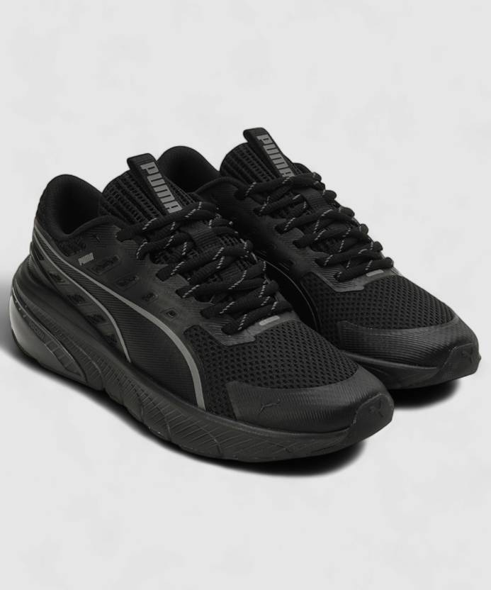 Side view of PUMA Men's Running Lace-Up Sneakers, showcasing the breathable upper, cushioned midsole, durable outsole, and iconic PUMA logo, designed for comfort and performance in running.