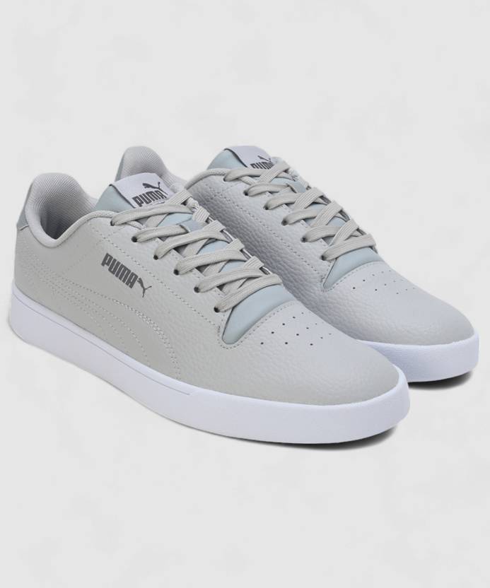 Side view of PUMA Men's Lifestyle Lace-Up Sneakers, showcasing the sleek design, breathable upper, cushioned insole, and iconic PUMA logo, designed for comfort and style in everyday wear.