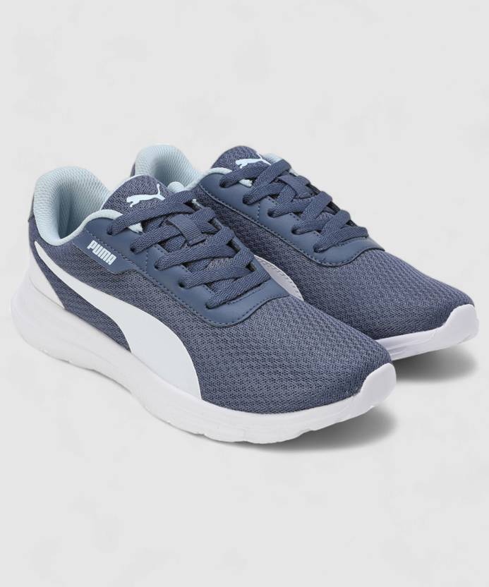 Side view of PUMA Women's Running Lace-Up Sneakers, showcasing the breathable upper, cushioned midsole, durable outsole, and iconic PUMA logo, designed for comfort and performance in running.