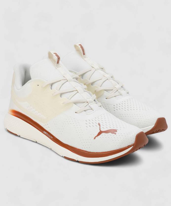 Side view of PUMA Men's Running Lace-Up Sneakers, showcasing the breathable upper, cushioned midsole, durable outsole, and iconic PUMA logo, designed for comfort and performance in running.