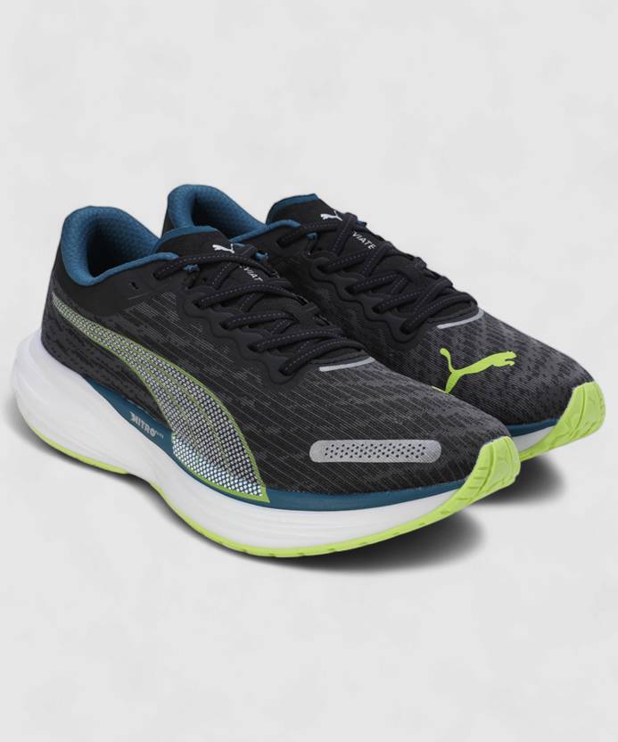 Side view of PUMA Men's Running Lace-Up Sneakers, showcasing the breathable upper, cushioned midsole, durable outsole, and iconic PUMA logo, designed for comfort and performance in running.