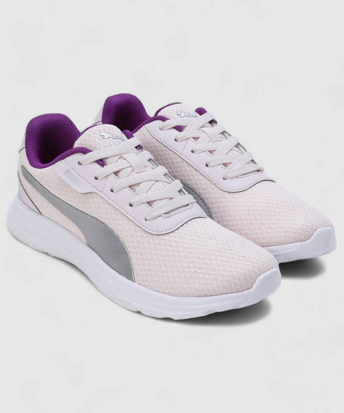 Side view of PUMA Women's Running Lace-Up Sneakers, showcasing the breathable upper, cushioned midsole, durable outsole, and iconic PUMA logo, designed for comfort and performance in running.