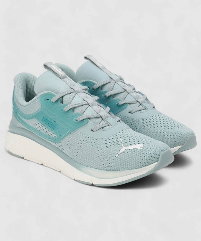 Side view of PUMA Women's Lifestyle Lace-Up Sneakers, showcasing the sleek design, breathable upper, cushioned insole, and iconic PUMA logo, designed for comfort and style in everyday wear.