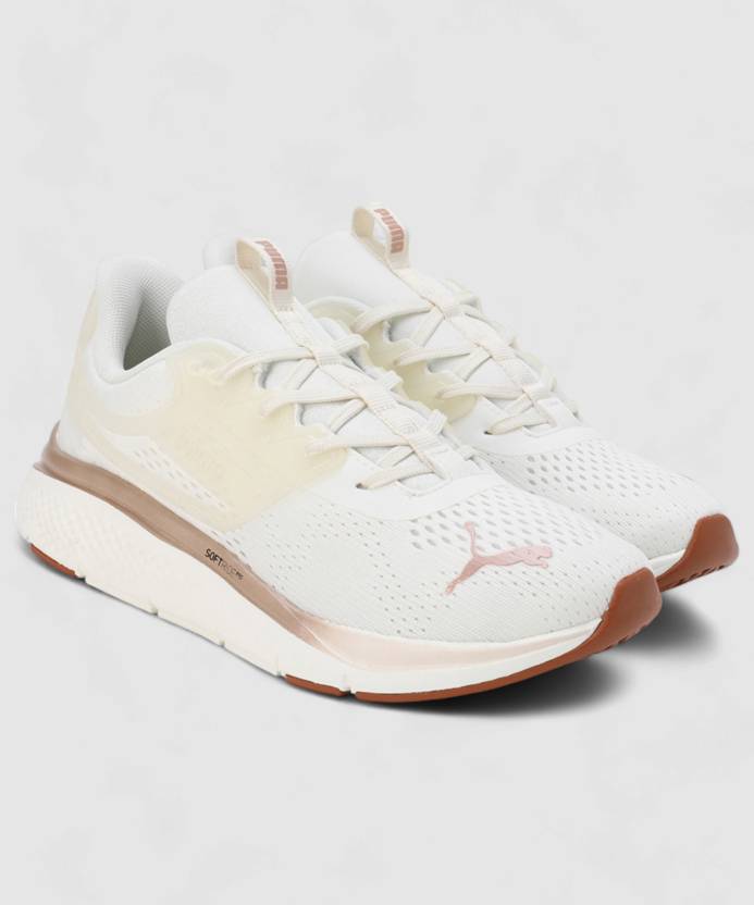 Side view of PUMA Women's Lifestyle Lace-Up Sneakers, showcasing the sleek design, breathable upper, cushioned insole, and iconic PUMA logo, designed for comfort and style in everyday wear.