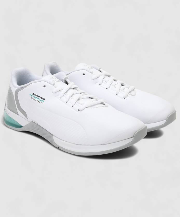 Side view of PUMA Men's Lifestyle Lace-Up Sneakers, showcasing the sleek design, breathable upper, cushioned insole, and iconic PUMA logo, designed for comfort and style in everyday wear.