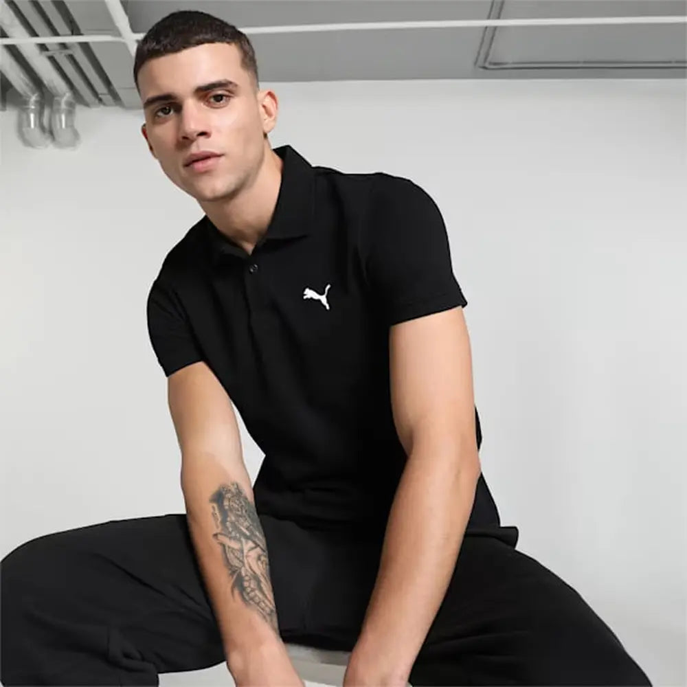 Front view of PUMA Men's Polo, showcasing the classic design, breathable fabric, and signature PUMA branding for a stylish and casual look.