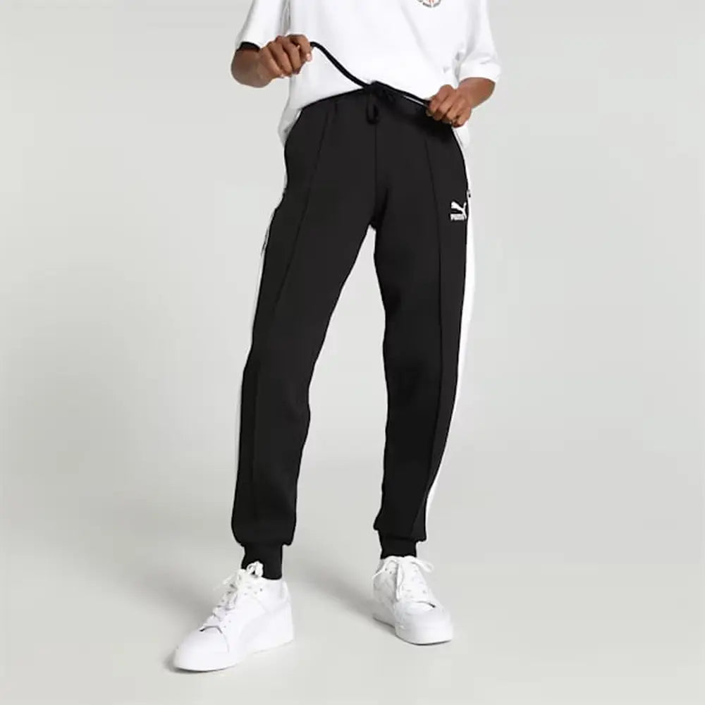 Side view of PUMA Men's Lower, showcasing its relaxed fit, breathable fabric, and signature PUMA logo for a casual, comfortable look.