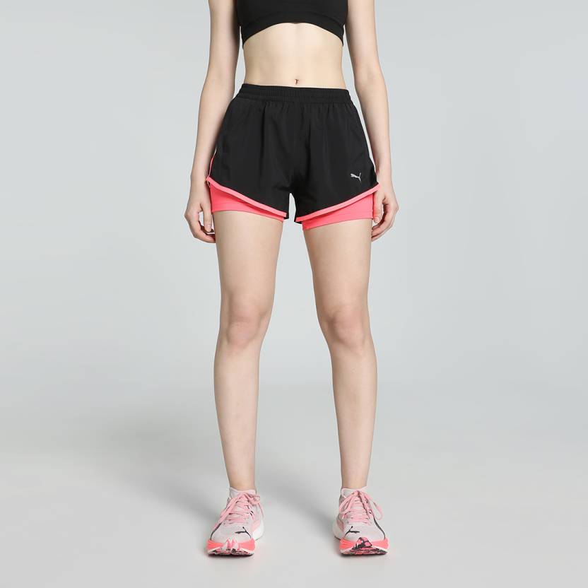 Side view of PUMA Women's Shorts, highlighting the lightweight fabric, relaxed fit, and signature PUMA logo for a stylish, comfortable lifestyle look.