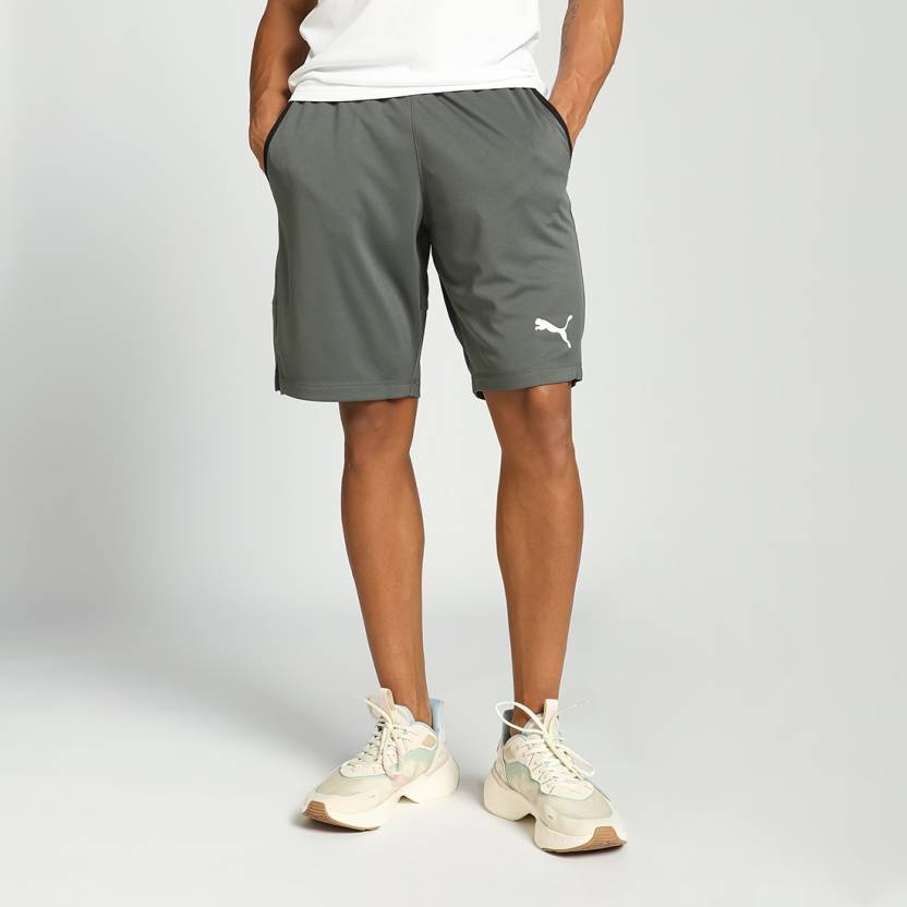 Side view of PUMA Men's Lower, showcasing its relaxed fit, breathable fabric, and signature PUMA logo for a casual, comfortable look.