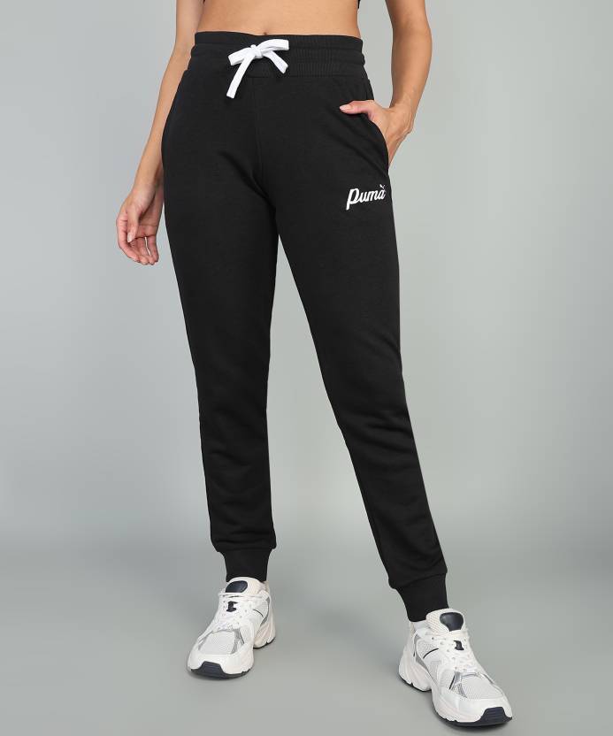 Side view of PUMA Women's Lower, highlighting the relaxed fit, soft fabric, and signature PUMA logo, perfect for casual wear and lifestyle activities.