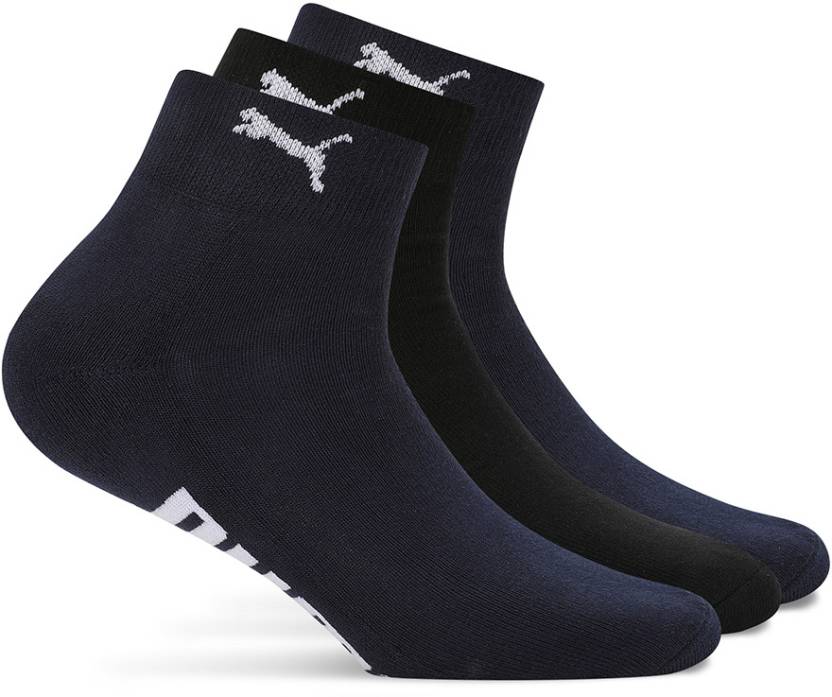 Close-up of PUMA Unisex Lifestyle PO3 Socks, highlighting the soft fabric, reinforced toe and heel areas, and the iconic PUMA logo, designed for comfort and durability in everyday wear.