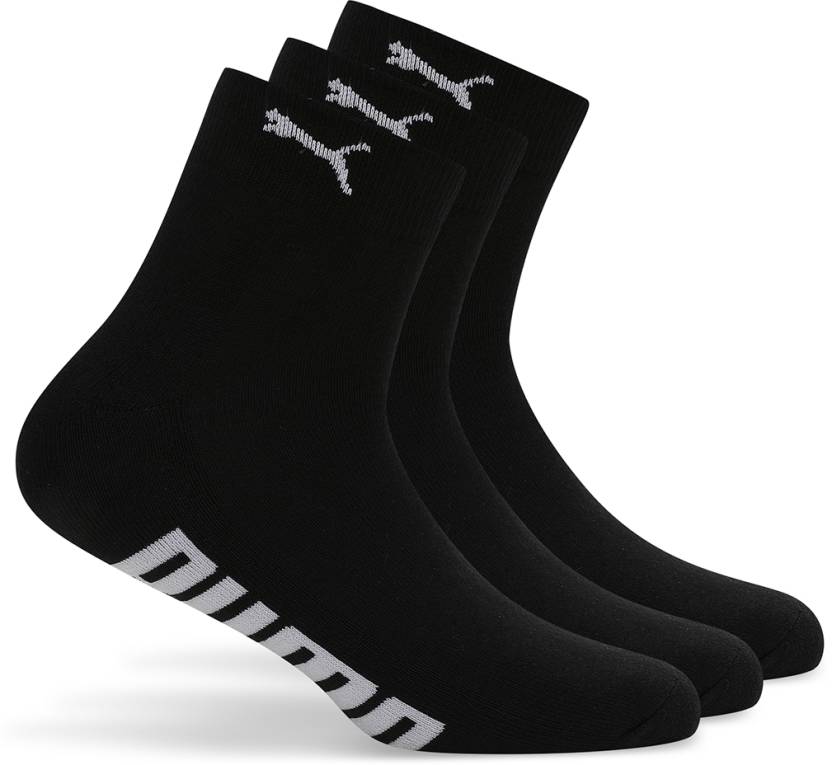 Close-up of PUMA Men's Lifestyle PO3 Socks, highlighting the soft fabric, reinforced toe and heel areas, and the iconic PUMA logo, designed for comfort and durability in everyday wear.