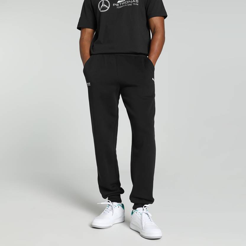 Side view of PUMA Men's Lower, showcasing its relaxed fit, breathable fabric, and signature PUMA logo for a casual, comfortable look.