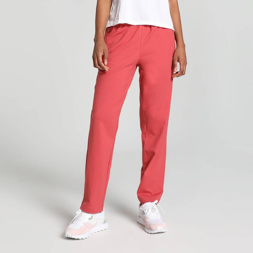 Side view of PUMA Women's Lower, highlighting the relaxed fit, soft fabric, and signature PUMA logo, perfect for casual wear and lifestyle activities.