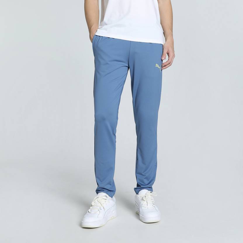 Side view of PUMA Men's Lower, showcasing its relaxed fit, breathable fabric, and signature PUMA logo for a casual, comfortable look.