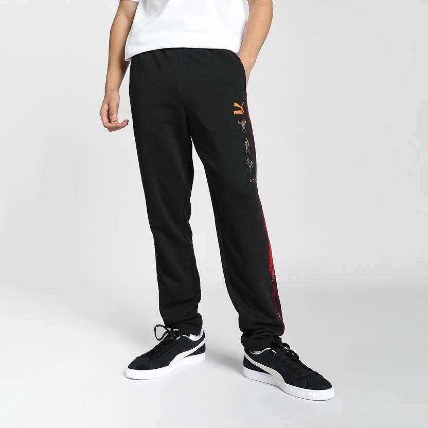 Side view of PUMA Men's Lower, showcasing its relaxed fit, breathable fabric, and signature PUMA logo for a casual, comfortable look.