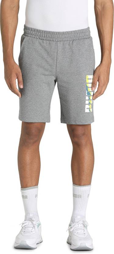 Side view of PUMA Men's Shorts, highlighting the relaxed fit, soft fabric, and signature PUMA logo for a comfortable and stylish casual look.