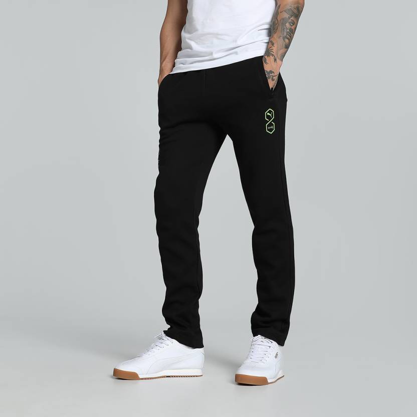 Side view of PUMA Men's Lower, showcasing its relaxed fit, breathable fabric, and signature PUMA logo for a casual, comfortable look.