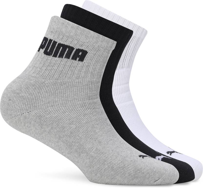 Close-up of PUMA Unisex Lifestyle PO3 Socks, highlighting the soft fabric, reinforced toe and heel areas, and the iconic PUMA logo, designed for comfort and durability in everyday wear.