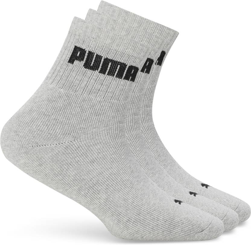 Close-up of PUMA Men's Lifestyle PO3 Socks, highlighting the soft fabric, reinforced toe and heel areas, and the iconic PUMA logo, designed for comfort and durability in everyday wear.