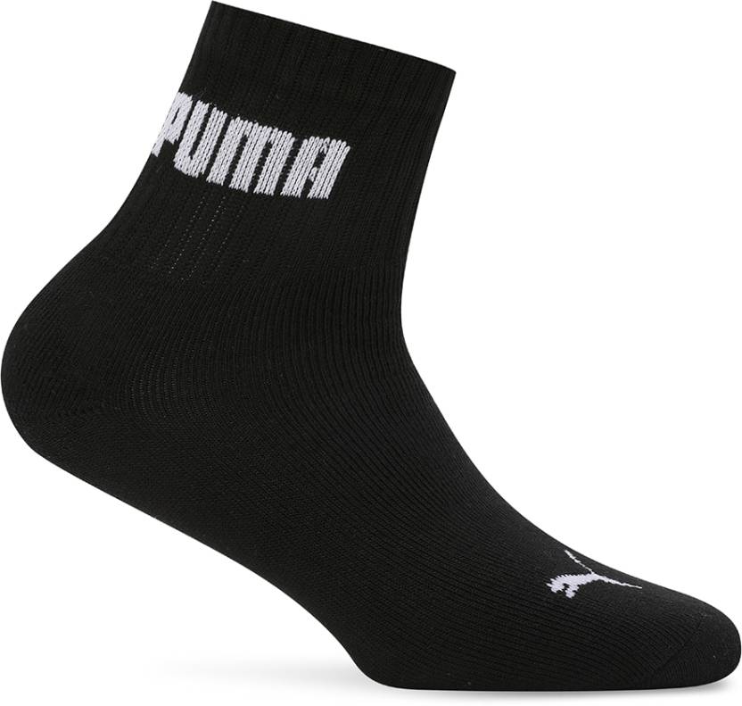 Close-up view of PUMA Unisex Lifestyle PO1 Socks, highlighting the soft fabric, snug fit, and iconic PUMA logo, designed for comfort and durability during everyday wear.