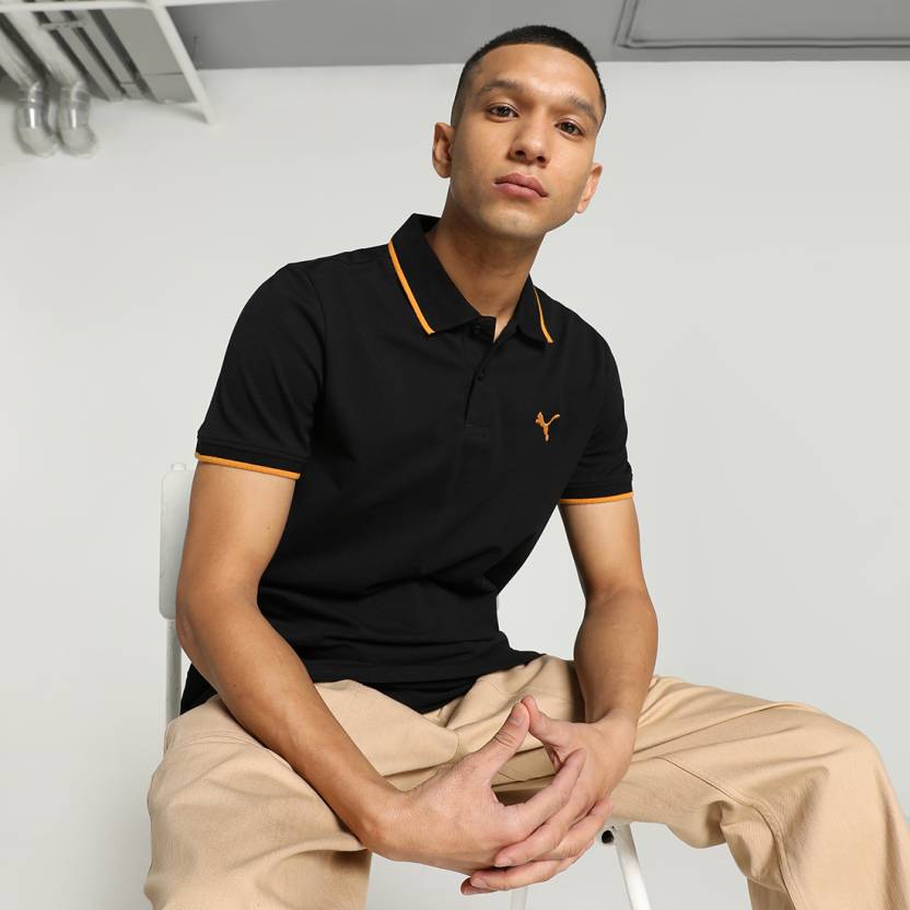 Front view of PUMA Men's Polo, showcasing the classic design, breathable fabric, and signature PUMA branding for a stylish and casual look.