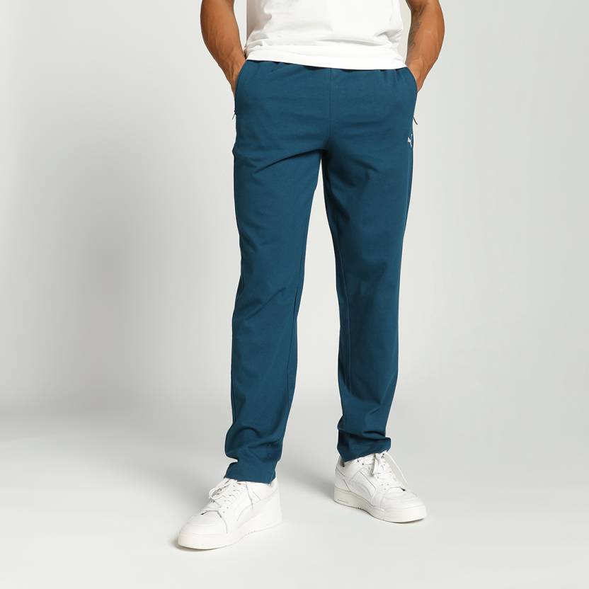 Side view of PUMA Men's Lower, showcasing its relaxed fit, breathable fabric, and signature PUMA logo for a casual, comfortable look.