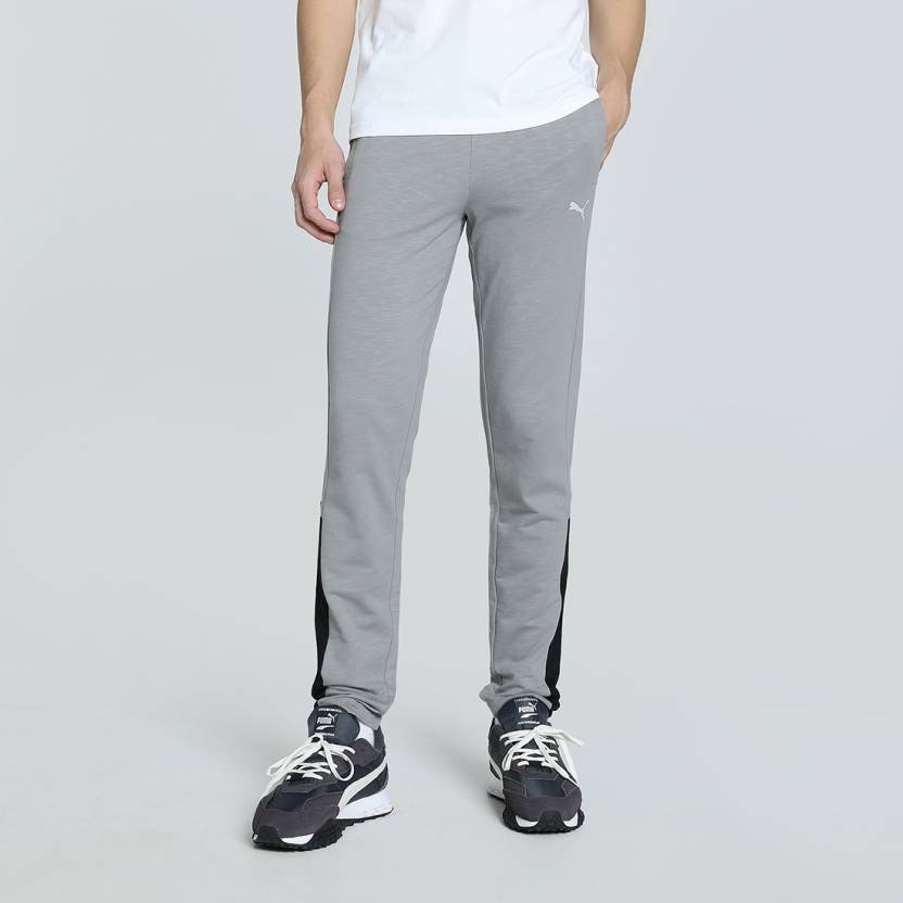 Side view of PUMA Men's Lower, showcasing its relaxed fit, breathable fabric, and signature PUMA logo for a casual, comfortable look.