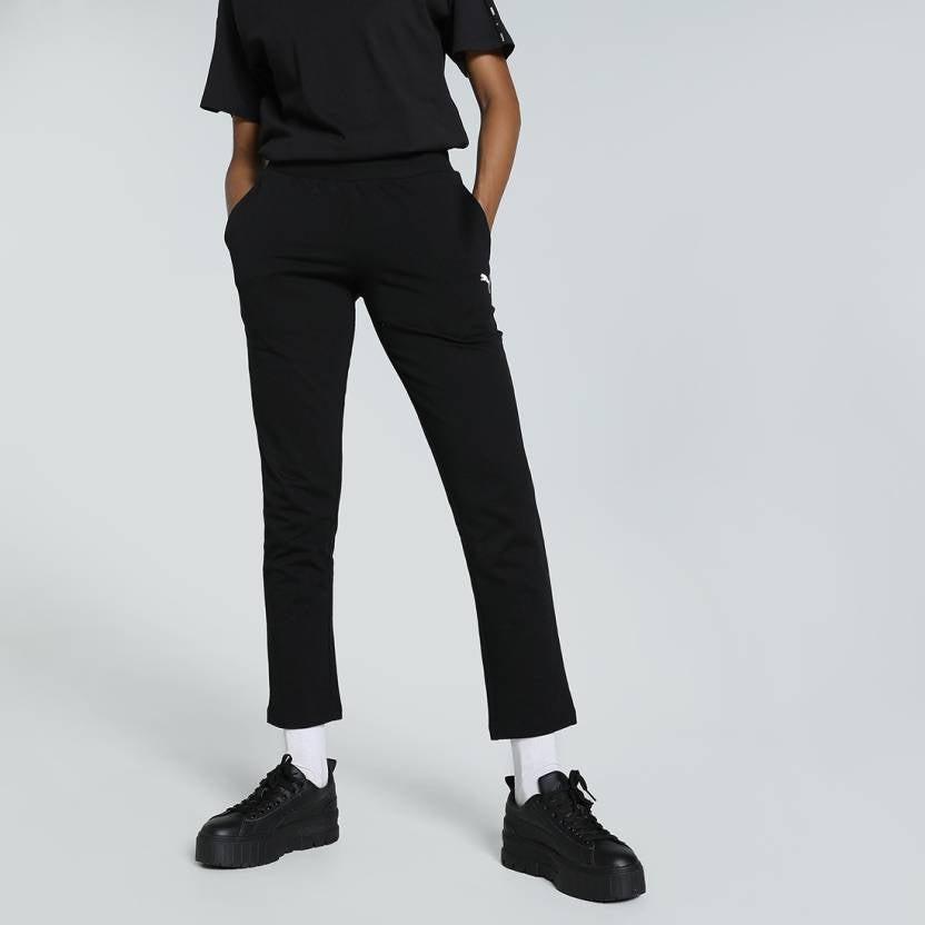 Side view of PUMA Women's Lower, highlighting the relaxed fit, soft fabric, and signature PUMA logo, perfect for casual wear and lifestyle activities.