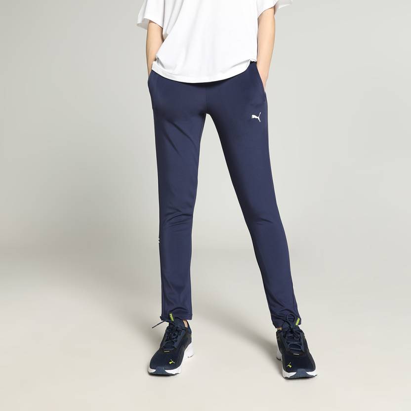 Side view of PUMA Women's Lower, highlighting the relaxed fit, soft fabric, and signature PUMA logo, perfect for casual wear and lifestyle activities.