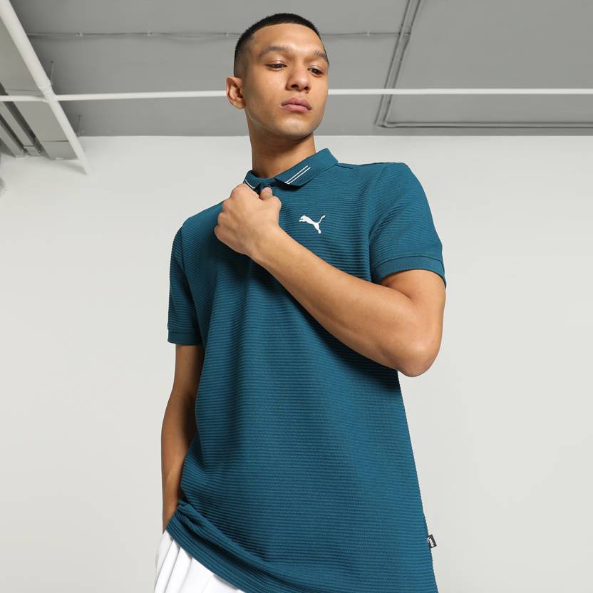 Front view of PUMA Men's Polo, showcasing the classic design, breathable fabric, and signature PUMA branding for a stylish and casual look.