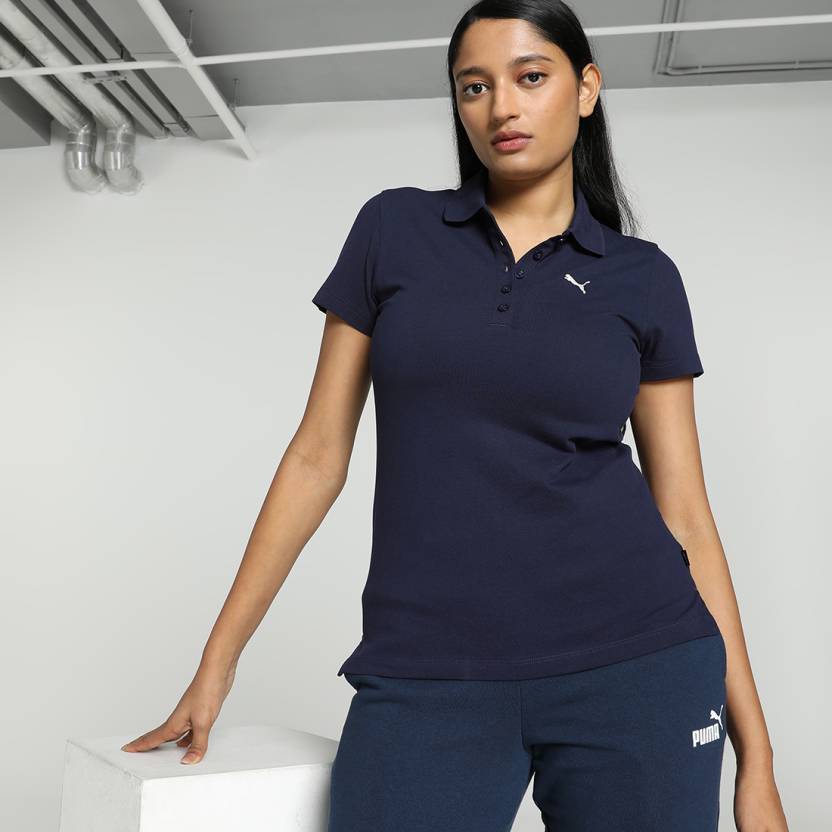 Front view of PUMA Women's Polo, highlighting the soft fabric, sleek fit, and signature PUMA logo, designed for casual and active wear.