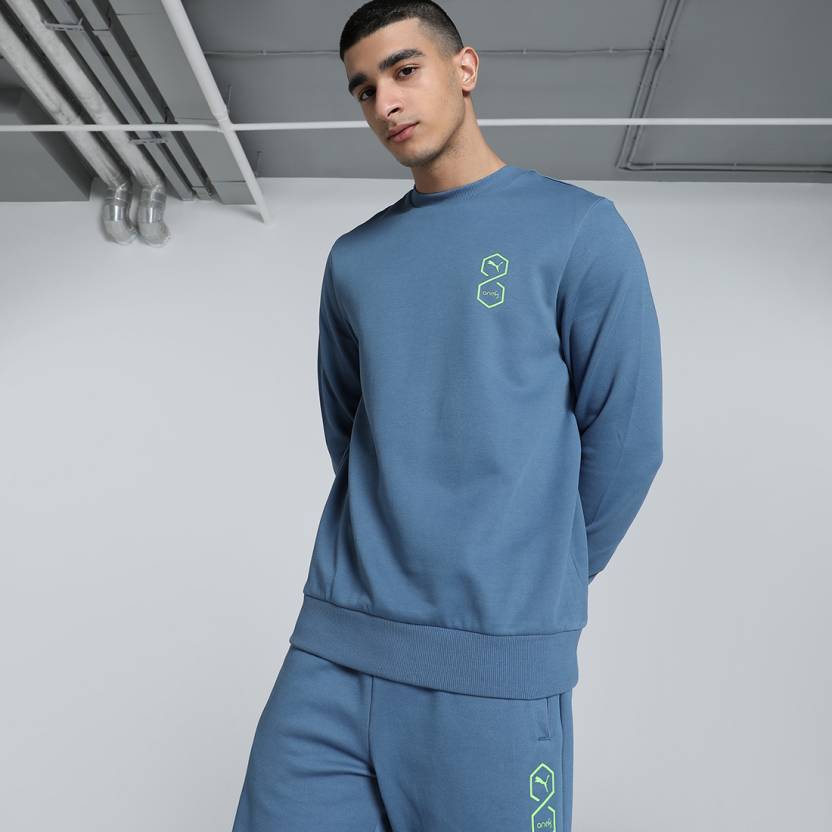 Front view of PUMA Men's Sweatshirt, showcasing the relaxed fit, soft fabric, and iconic PUMA logo for a modern and comfortable lifestyle look.